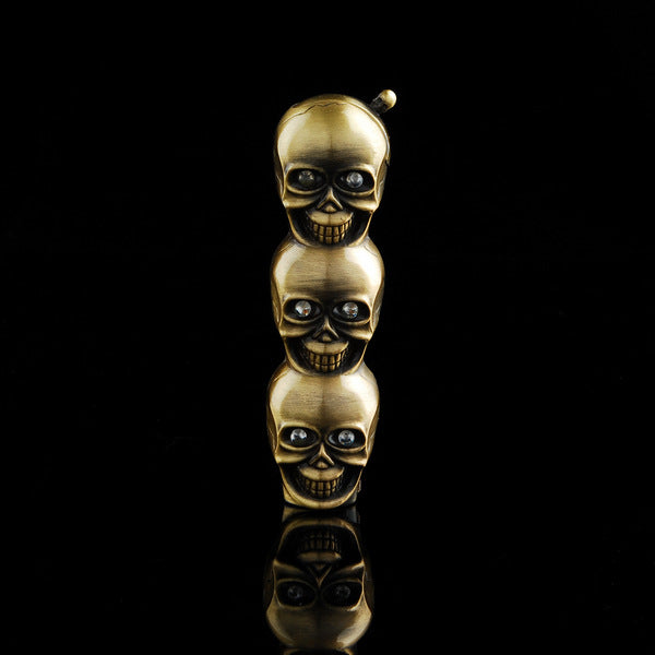 New and exotic creative gas lighters three skulls windproof green flame lighter