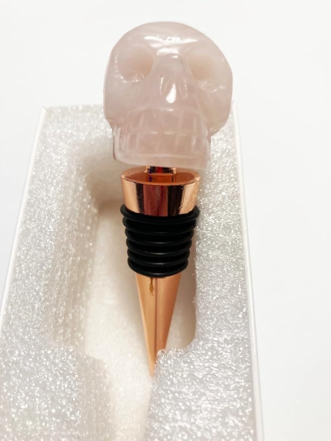 Mazeology’s Handcarved Gemstone Quality Rose Quartz Carved SKULL Shaped Wine Bottle Stopper with Six Silicon Food Grade Rings and Rust-proof Aluminum to keep wine fresh. - skull bottle